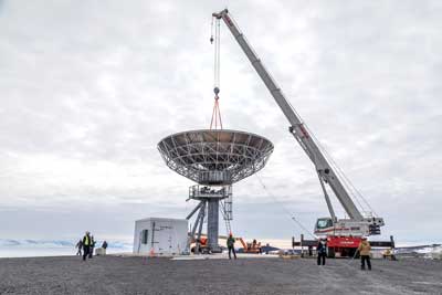 lowering the dish onto the pedestal